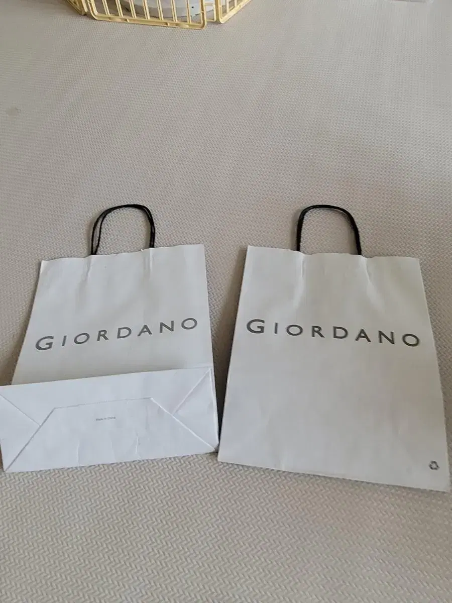 Two Giordano paper bags