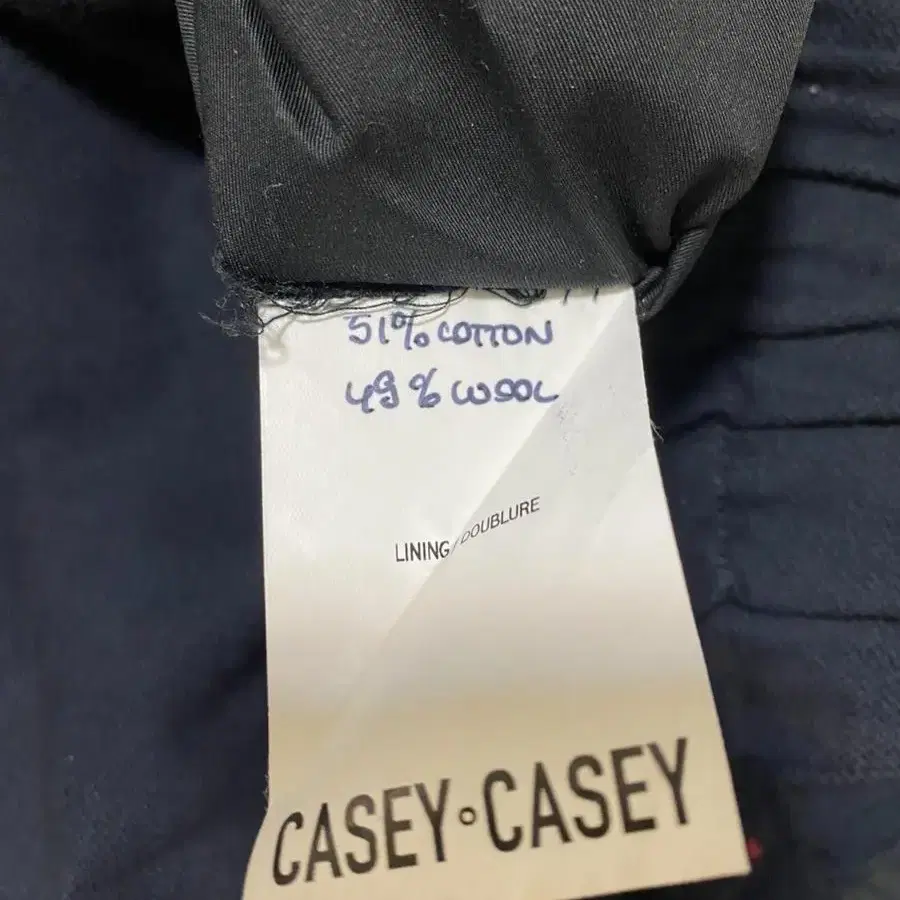 casey casey 케이시케이시 코튼울 배기 크롭 팬츠 (다크네이비)