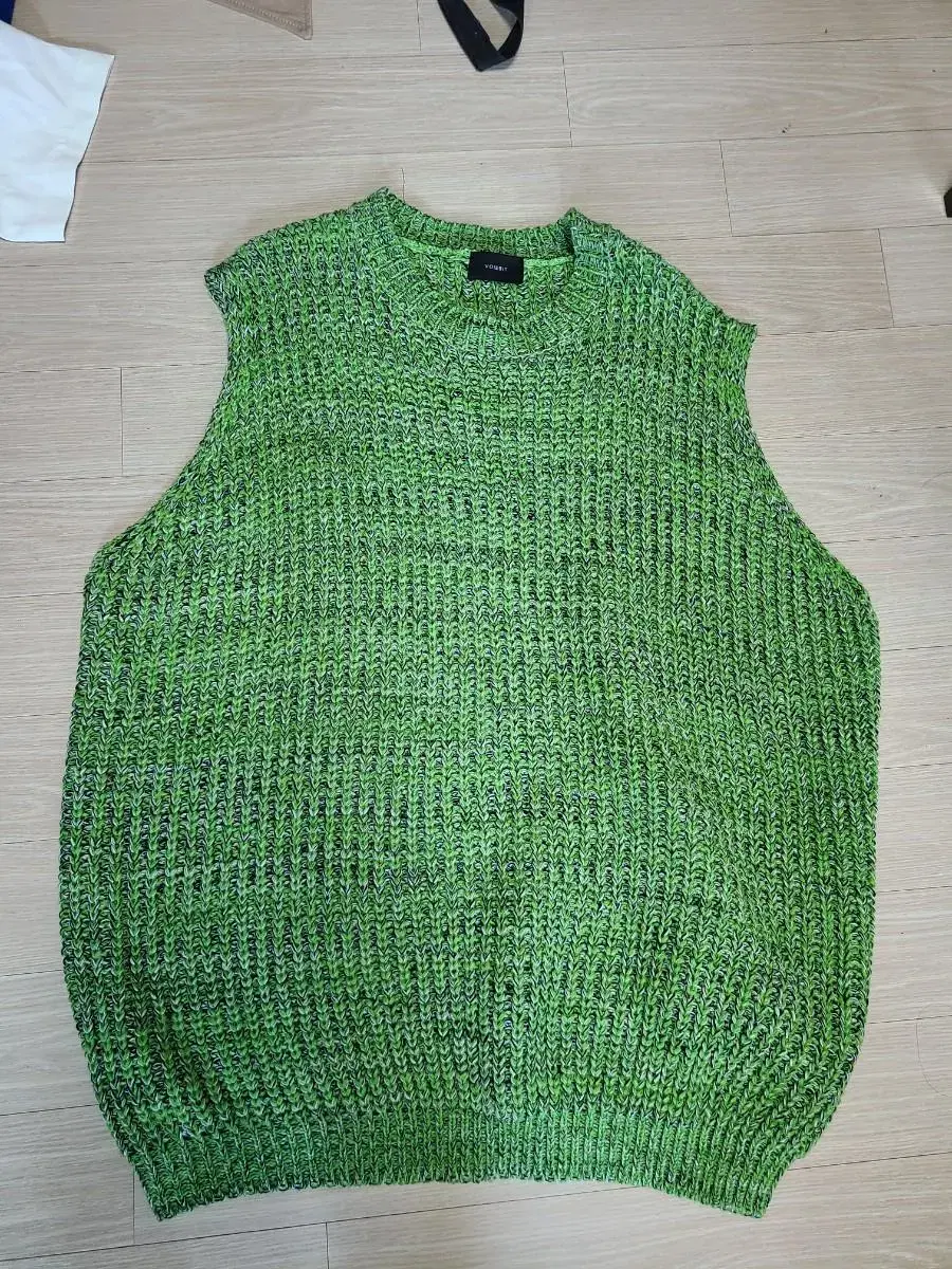 Green knit vest