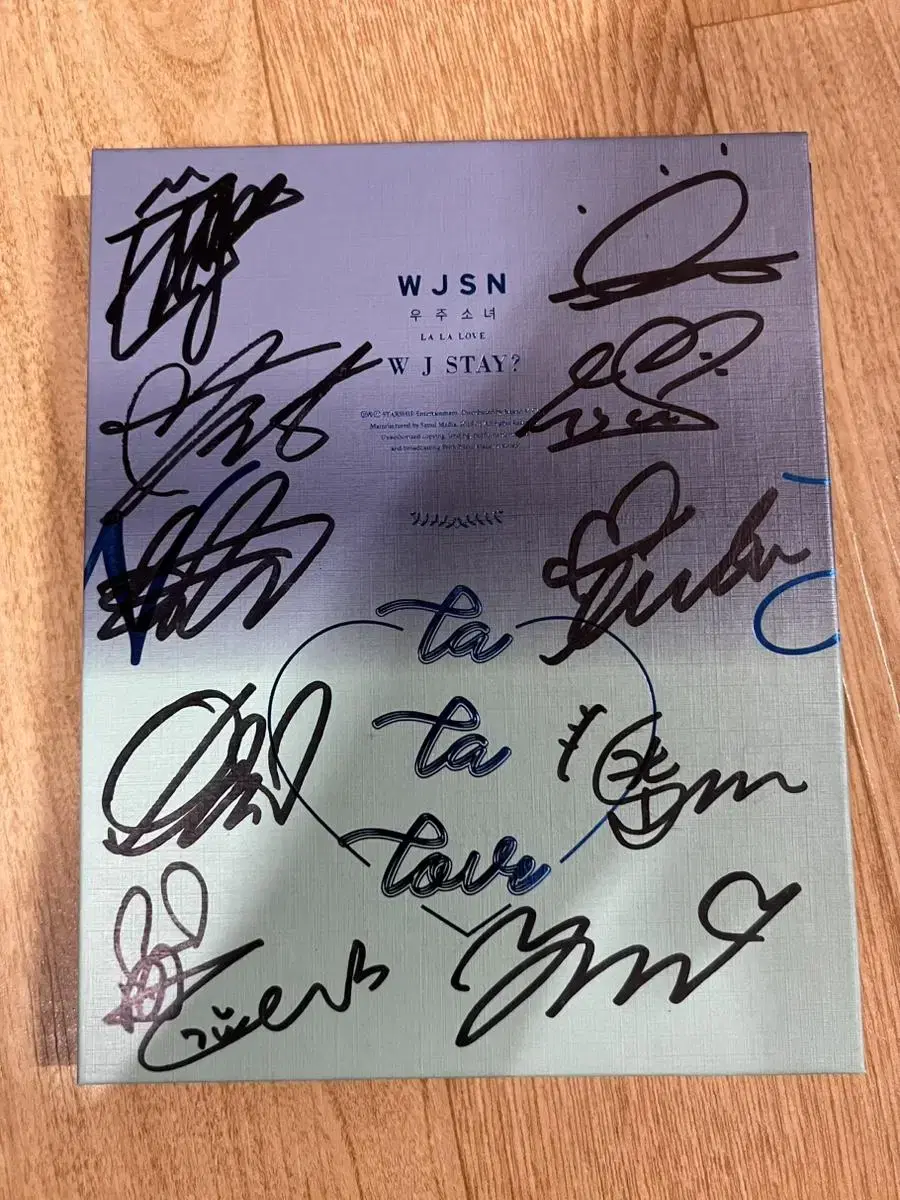 WJSN Written by WJSN sign Album