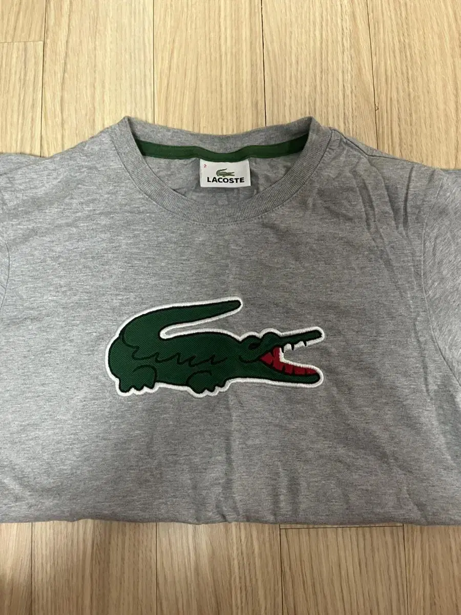 Lacoste short sleeves size 2