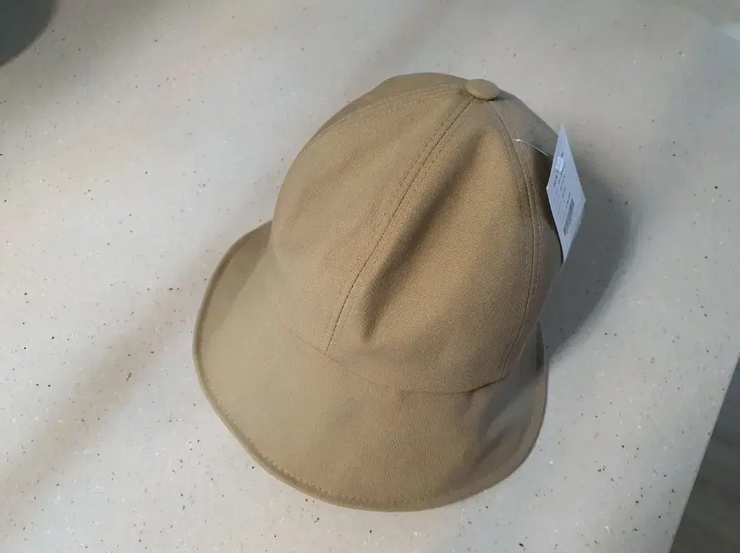 Beige brimmed hat