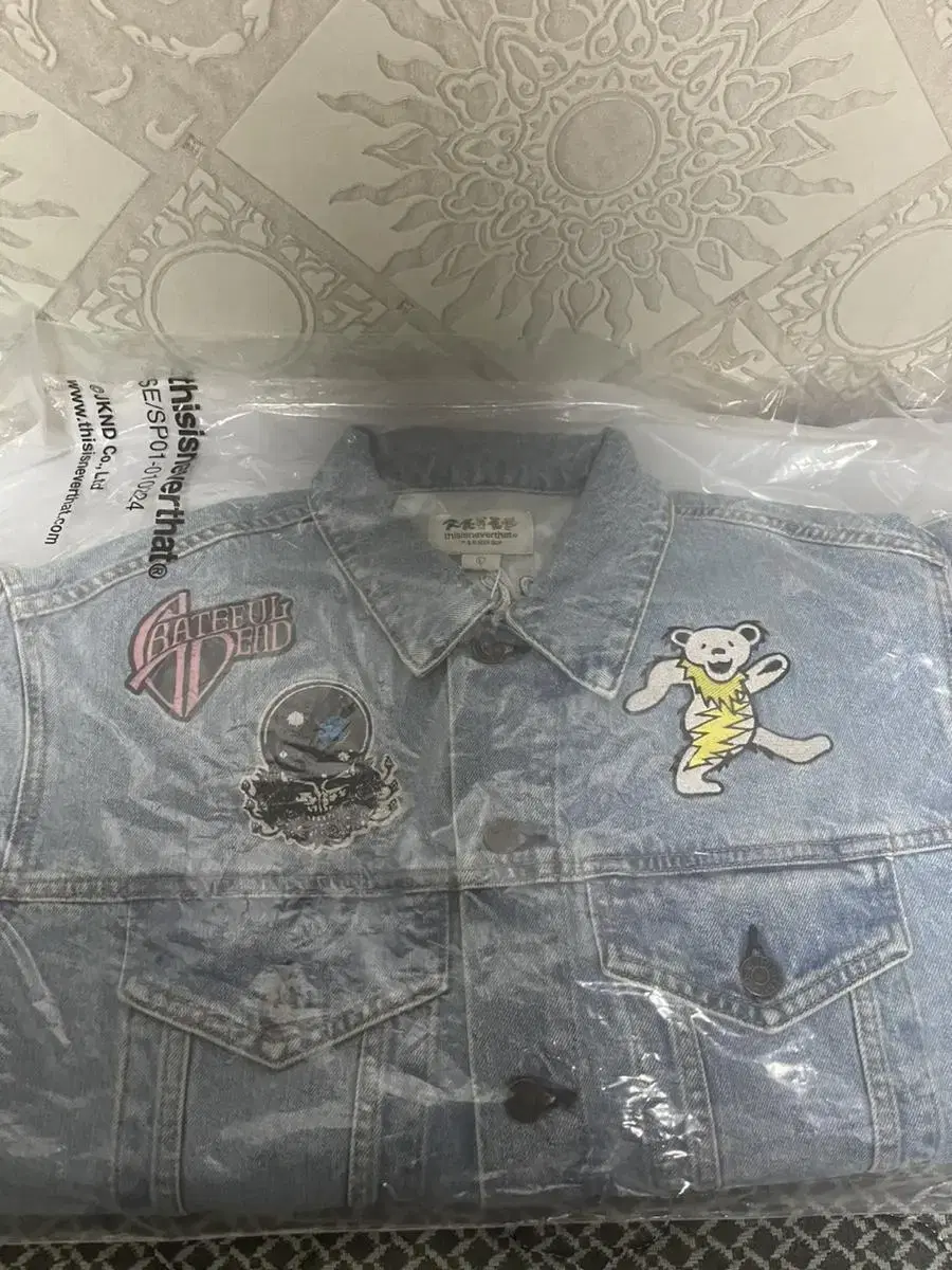 [L] This Is Never That x Grateful Dead Lightning Trekker Jacket Washed Out