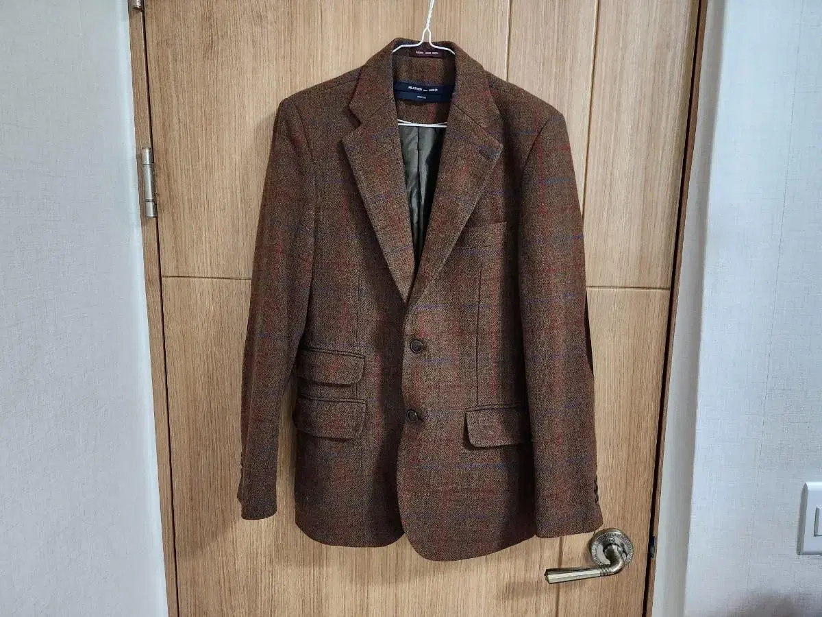 (95)100% wool checked jacket from Haddon & Miro