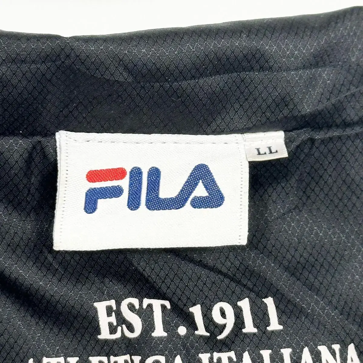 FILA 휠라 스몰로고 올드 박시 바람막이 자켓 (2XL)