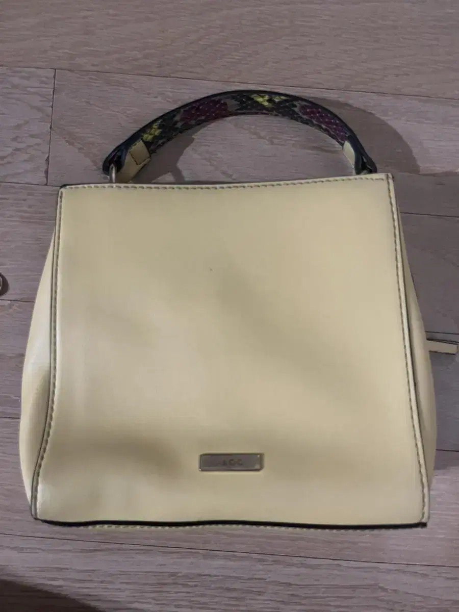 Aldo light yellow handbag