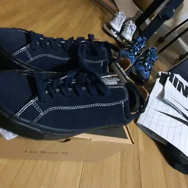 LAST RESORT AB NAVY SNEAKERS.