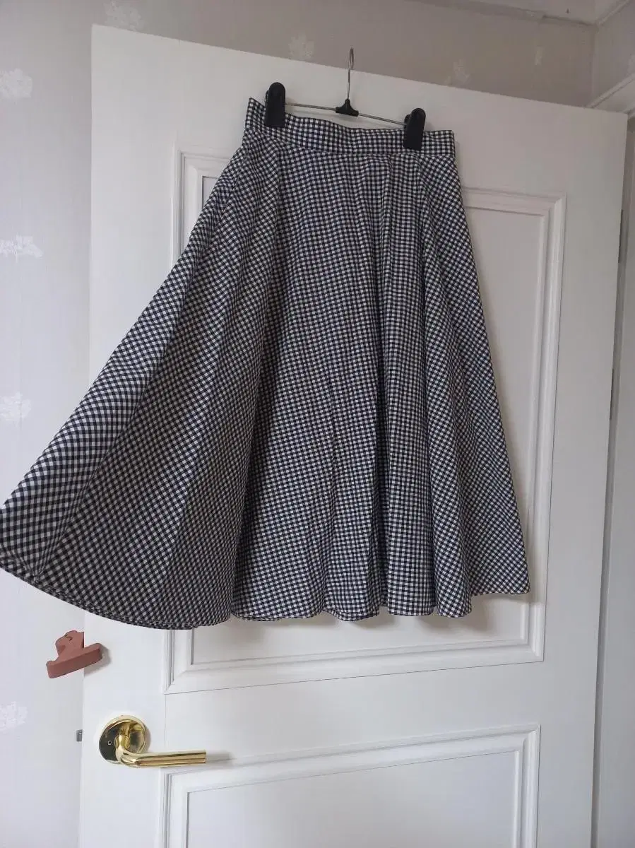 Uniqlo Cotton-blend checked flared skirt