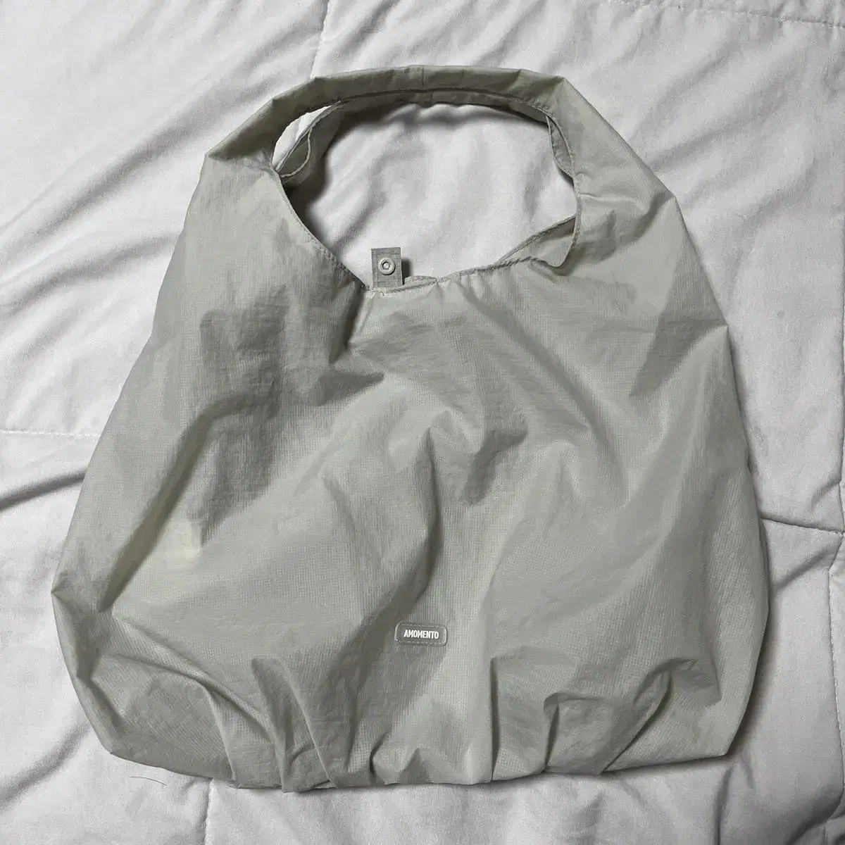 아모멘토 RIPSTOP SHIRRING BAG (GREY)