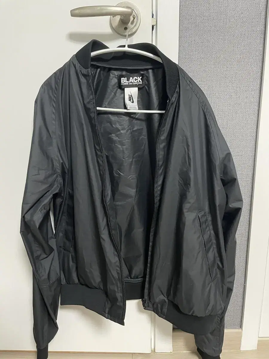 Comme des Garçons Song Black x Nike Bomber sells