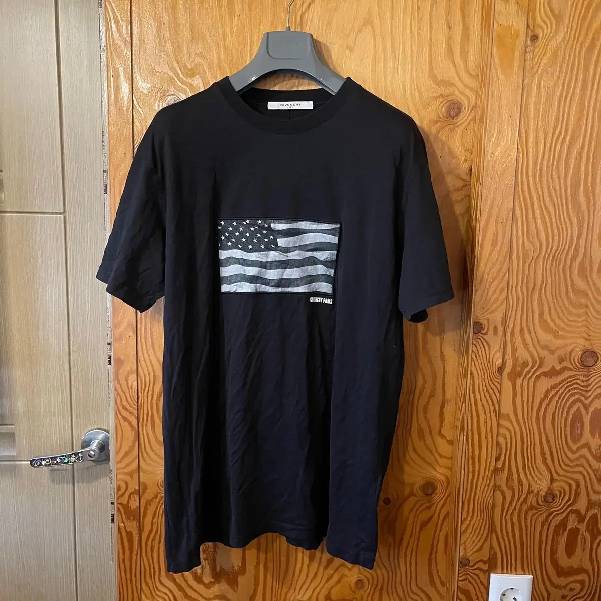 Givenchy's Stars and Stripes logo short sleeve t-shirt is available at sell.