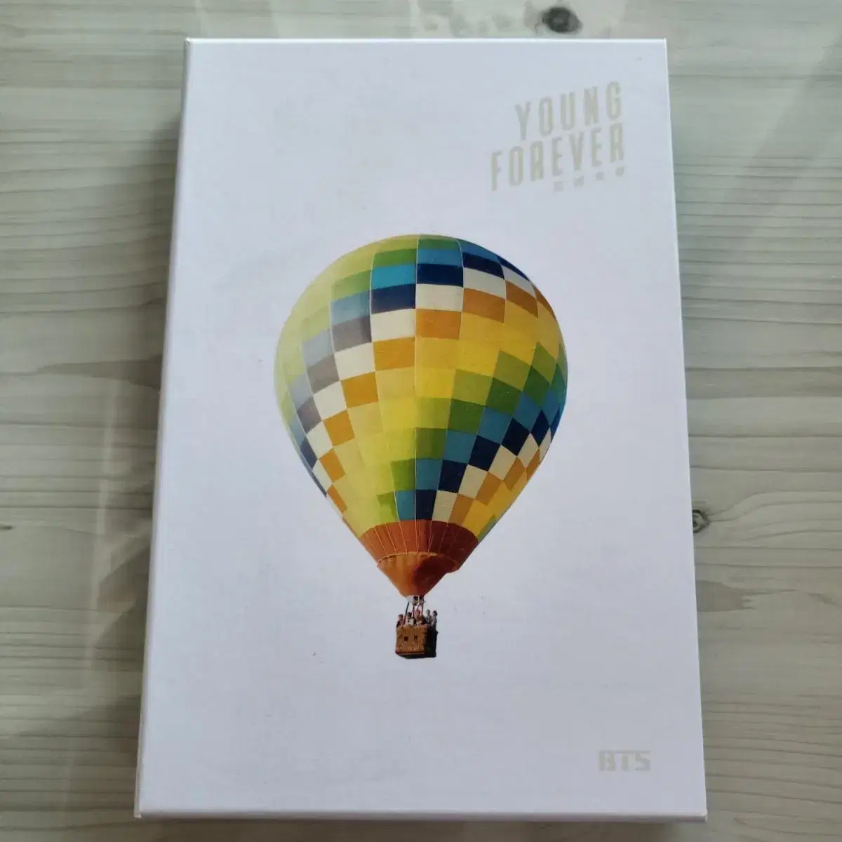 BTS's YOUNG FOREVER album with photocard.