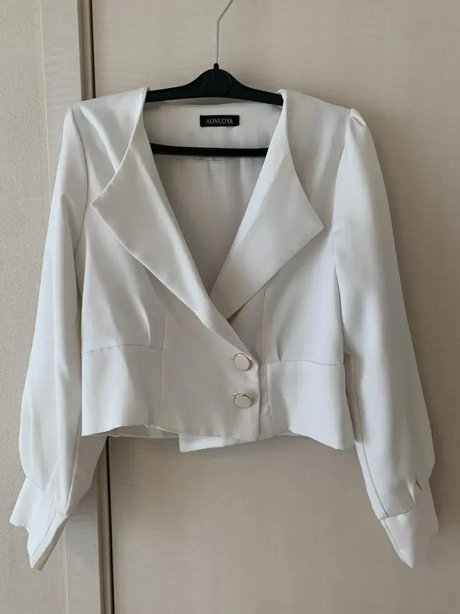 kara -jacket with white crop top