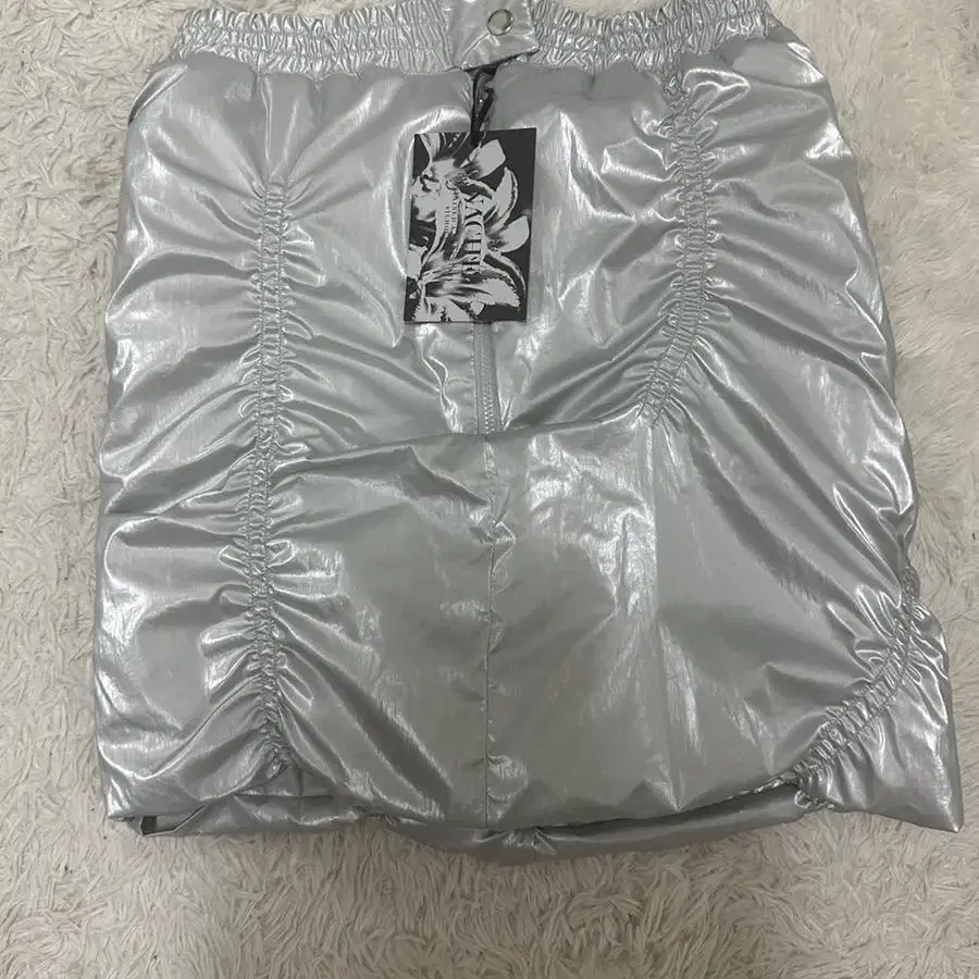 GLARE REVERSIBLE PADDING SKIRT SILVER