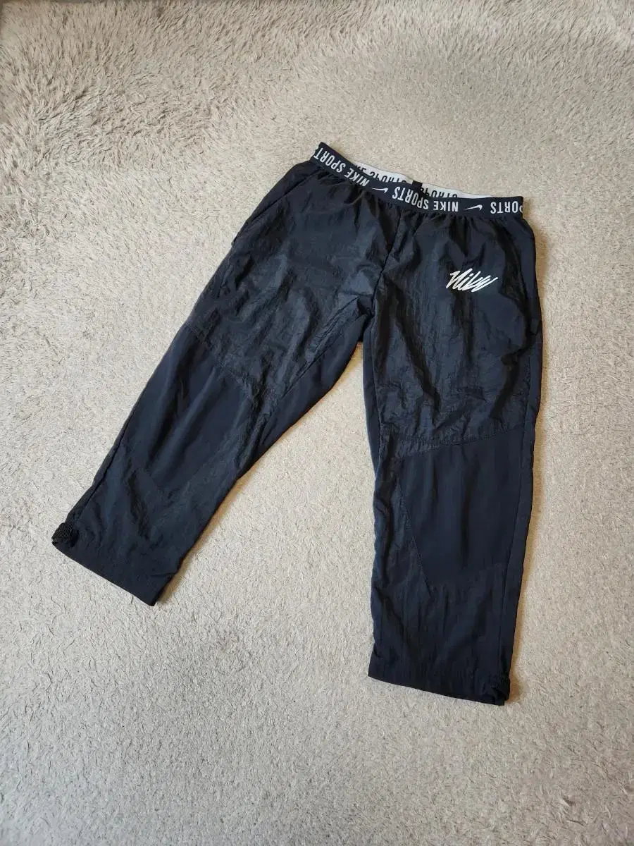 XL Nike Woven Training Pants for $119,000