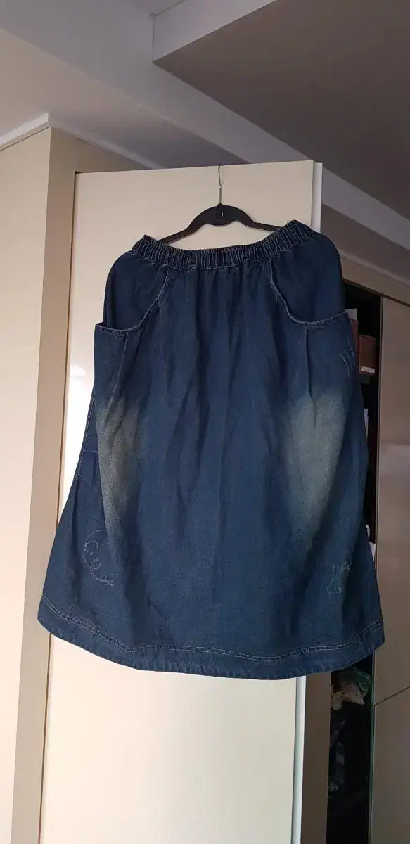 jar-shaped blue skirt