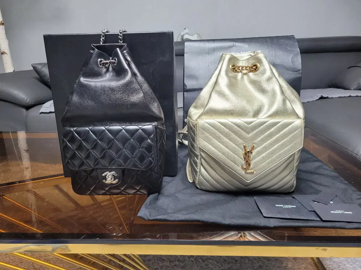 Chanel Backpack 520. Saint Laurent 240 Closure