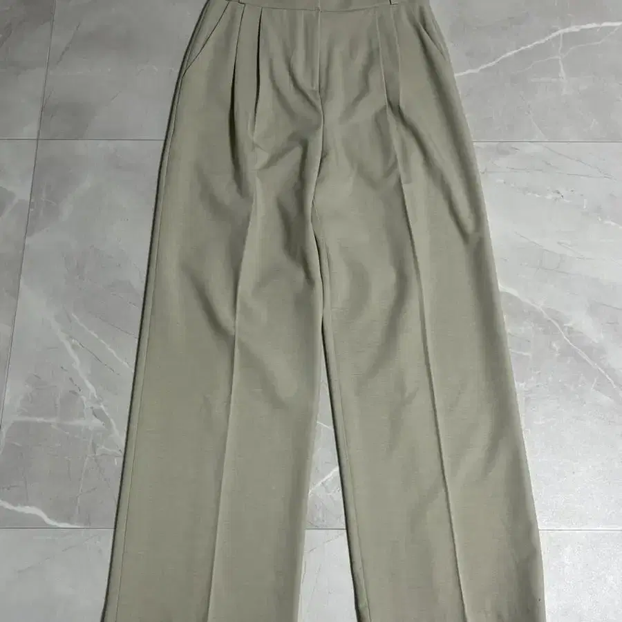 beige pintuck slacks