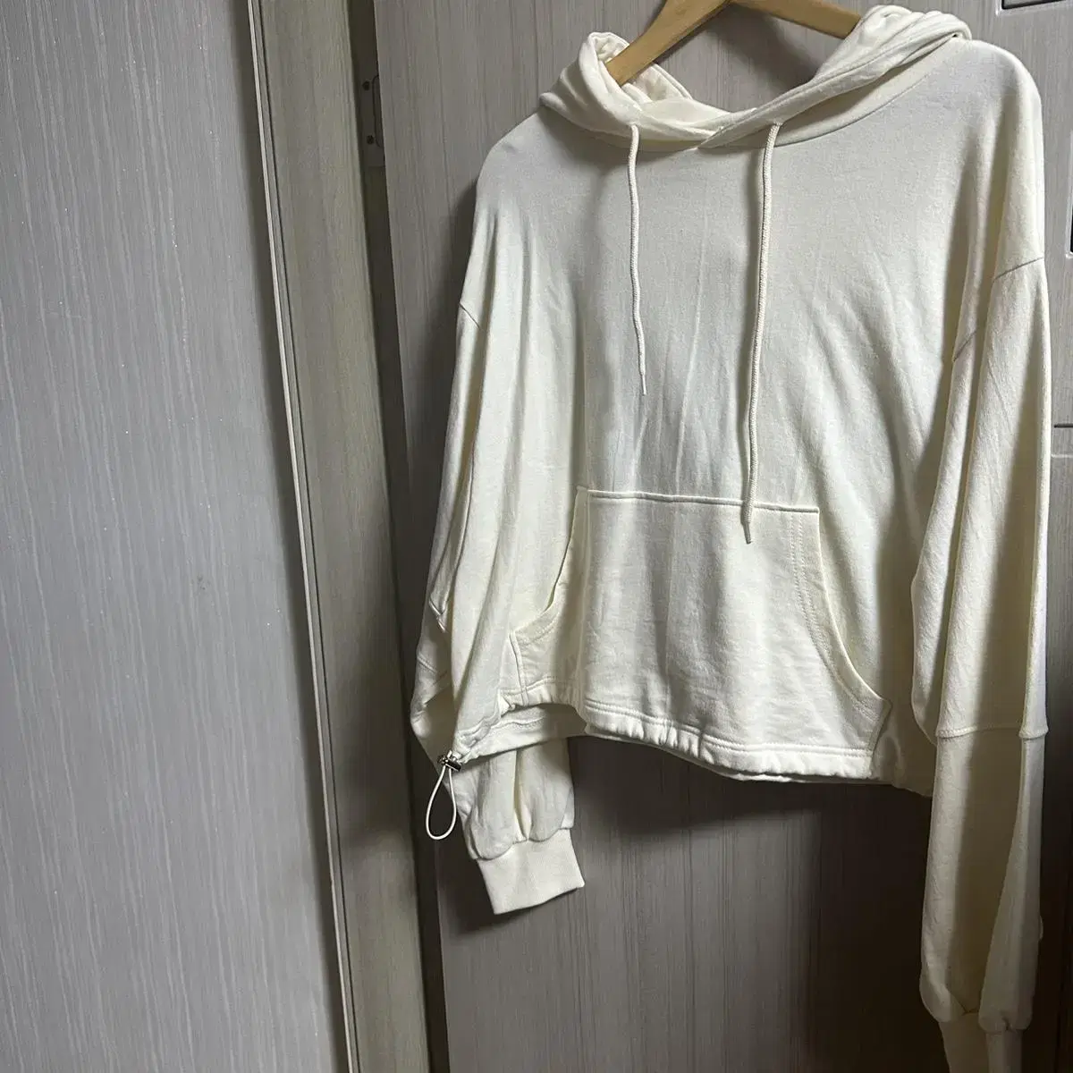 Cream-colored string hoodie