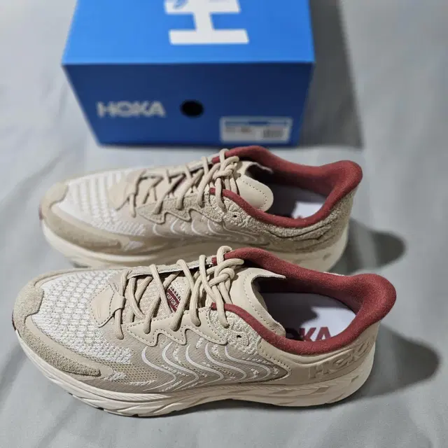 (275) HOKA CLIFTON LS SHIFTING SAND-RUST