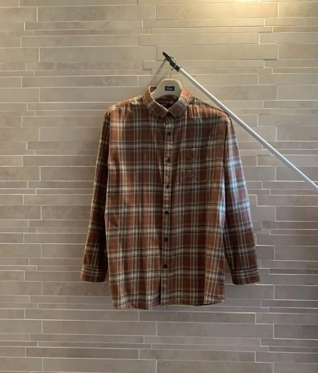 I'm selling a spao brown checked shirt (unisex)