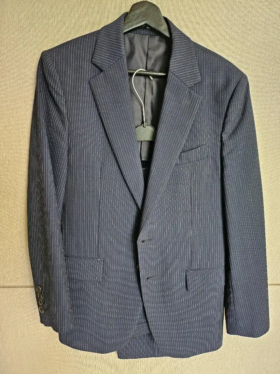 Geosongio striped suit for sale.