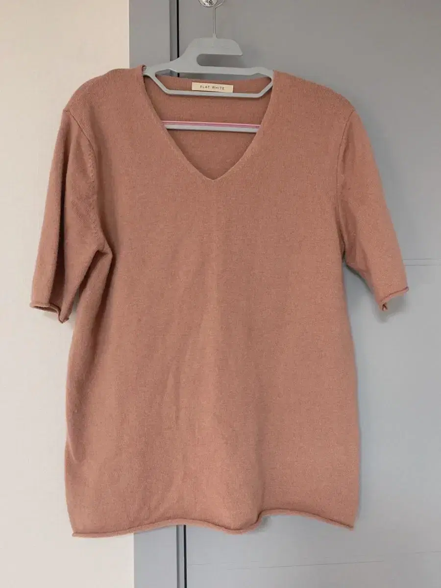 V-neck knit with good fabric (I can't tell the color)