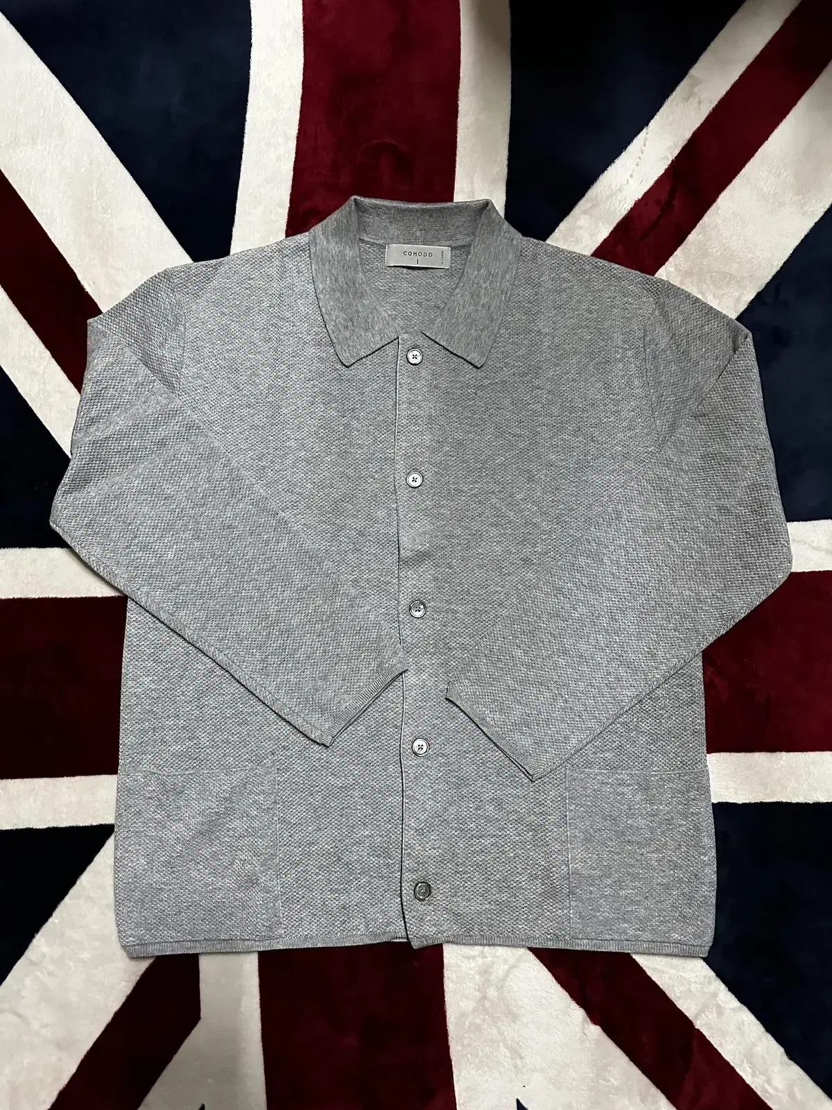 I am selling my Komodo/Kara button down cardigan in gray color/XL.