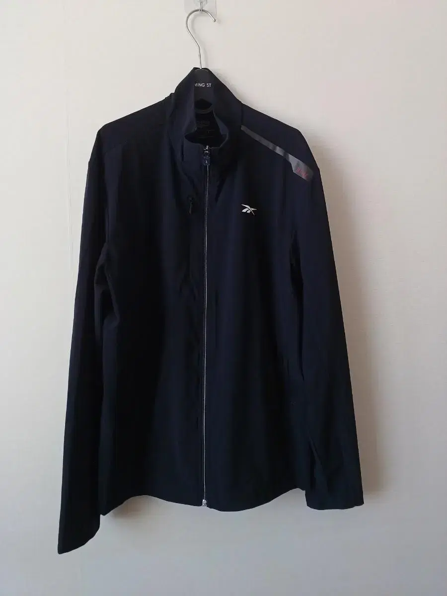 Unworn Reebok zip-up jacket 110