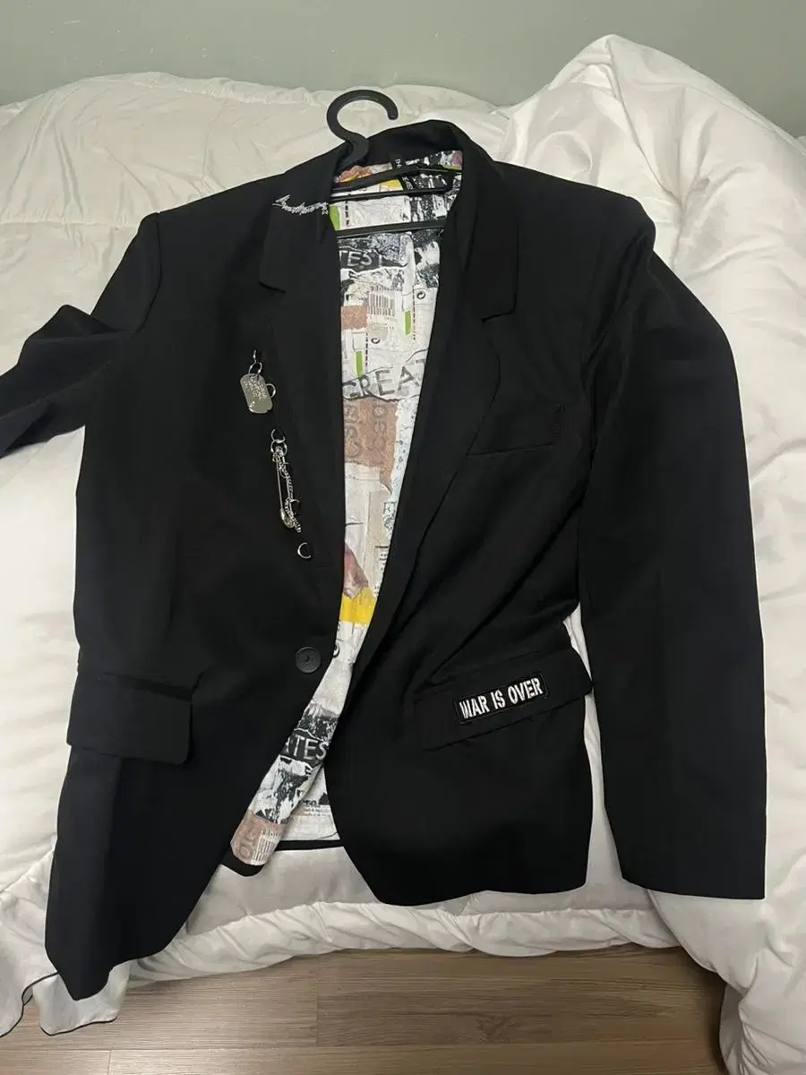 Selling a man's black jacket