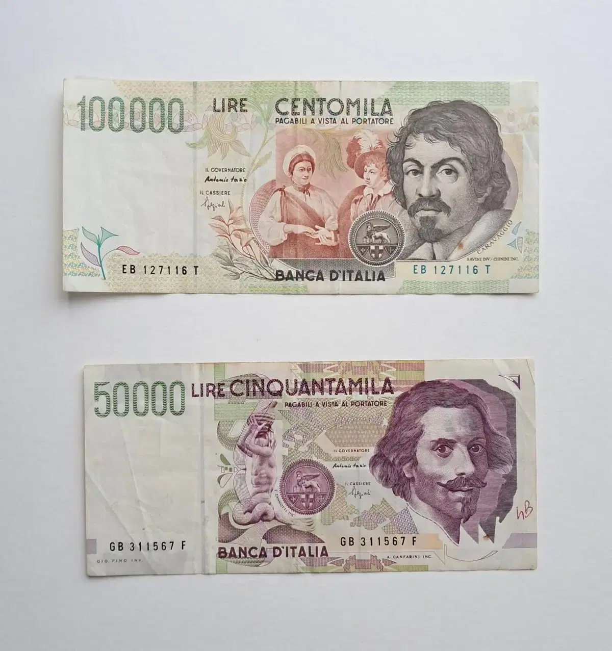 Two types of Italian banknotes