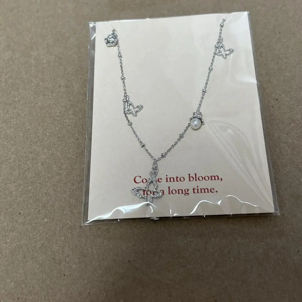 피오레 tinkle fleur wing necklace