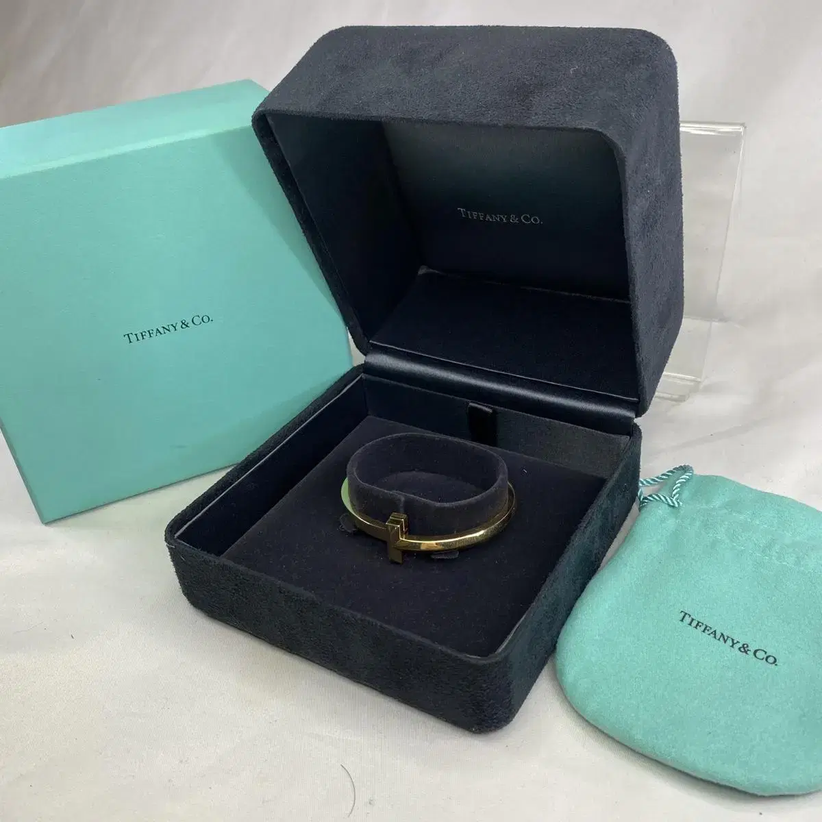 L) Tiffany & Co Wide Hinged Bracelet