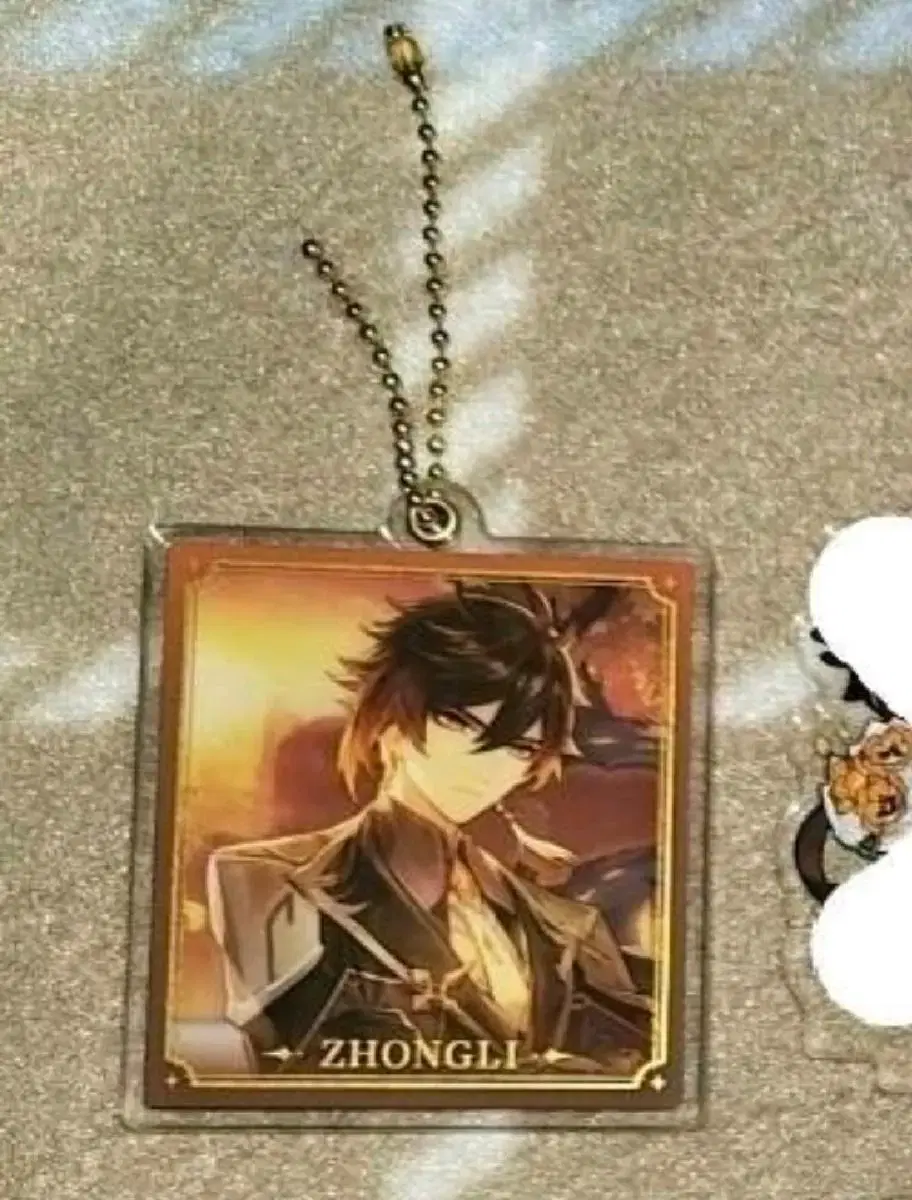 Genshin Impact Palm Official Slides keyring are for sale!