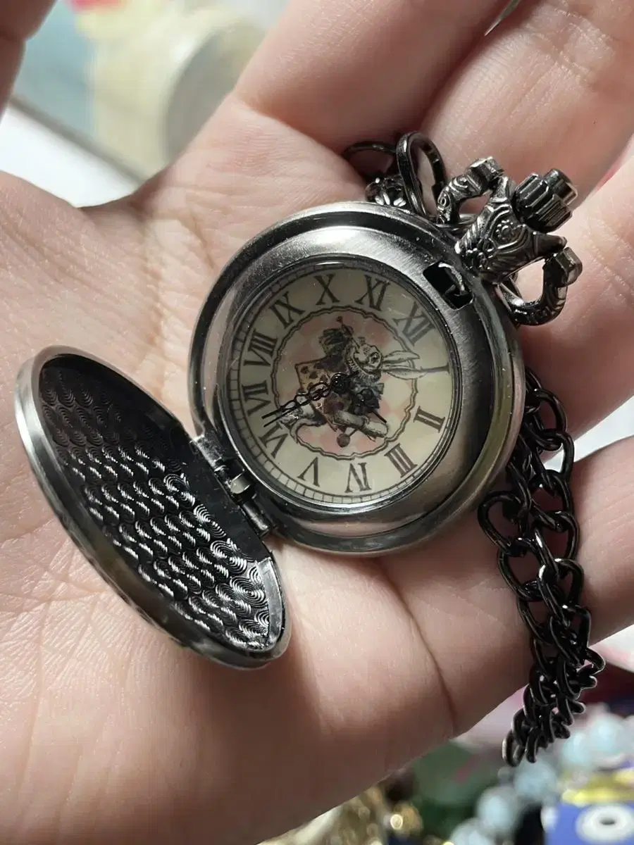 alice pocket watch in Wonderland