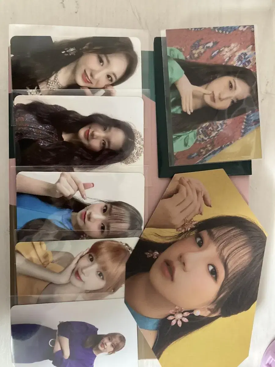 Unsealed album with iz*one components