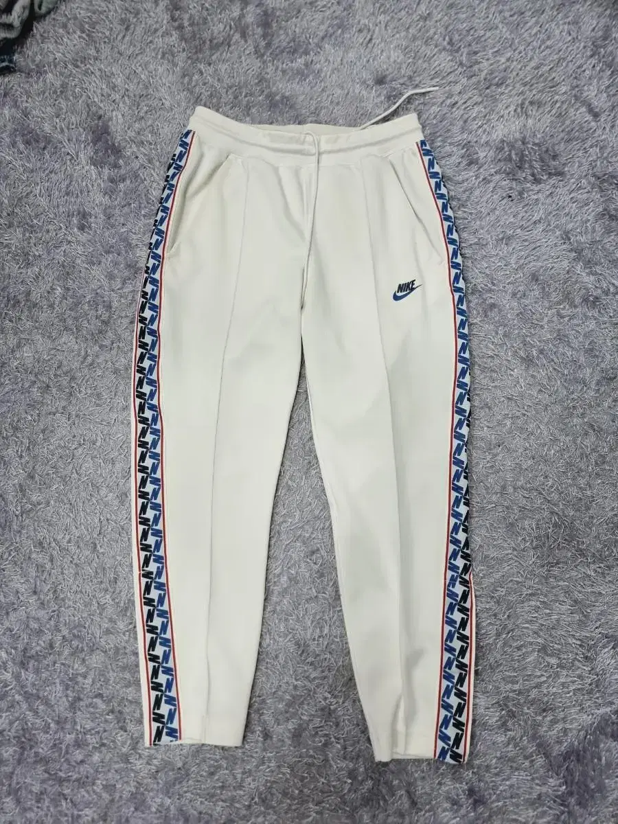 Nike Trousers NSW Tapered Pole Tab Track Pants White M