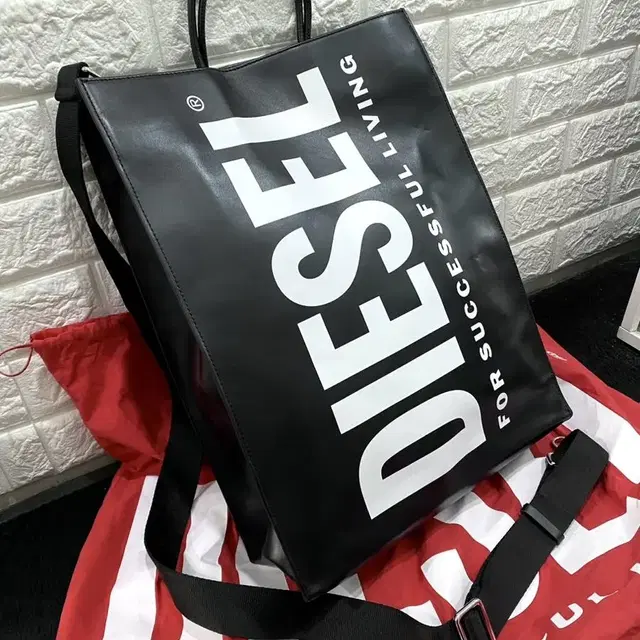 DIESEL 디젤 DSL로고 쇼퍼백(L)