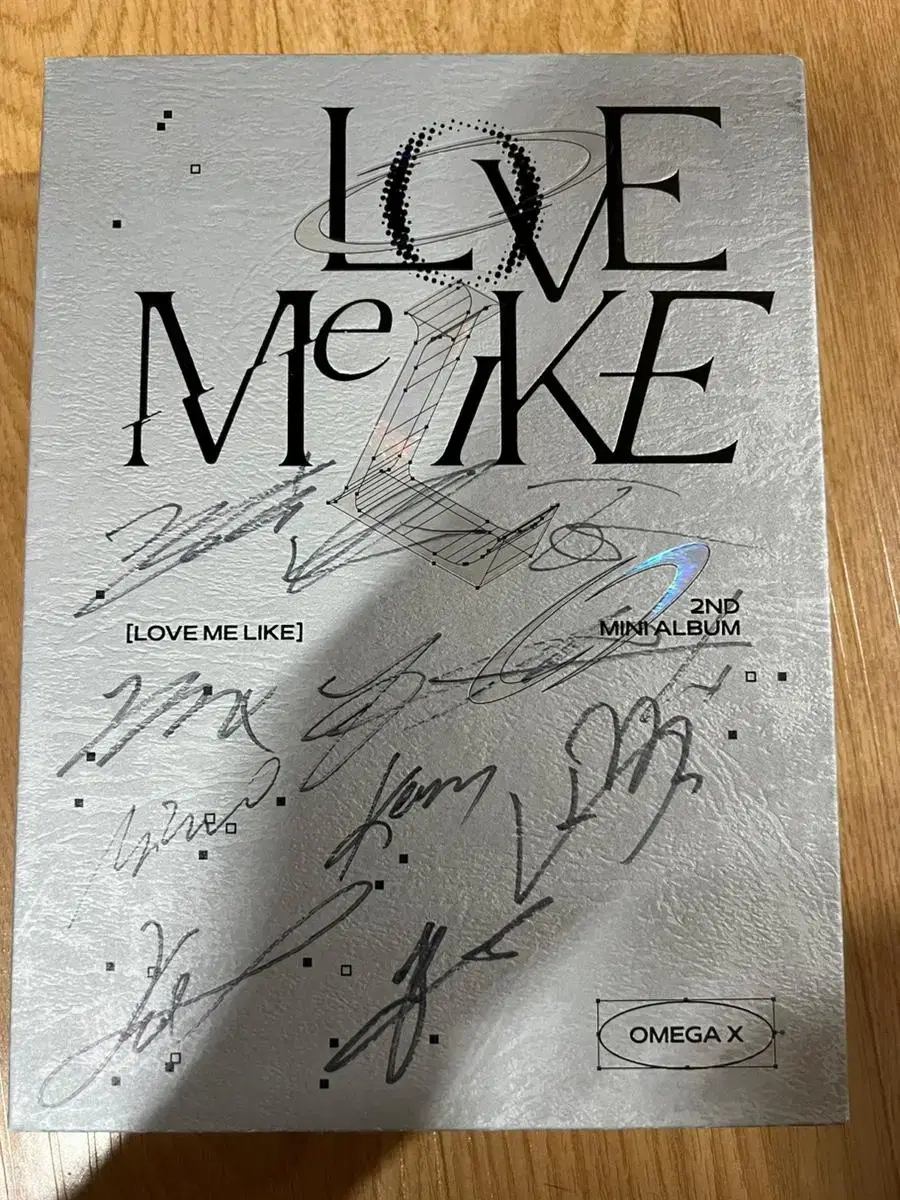 OMEGA X handwritten sign album