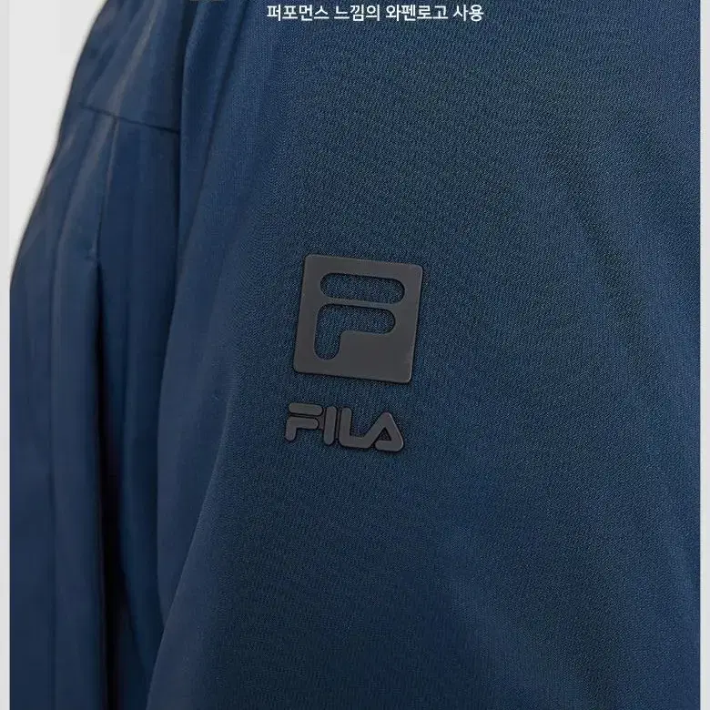 정가32만원 휠라 FILA 프리미엄 라쿤후드 거위털 구스다운 롱패딩 95