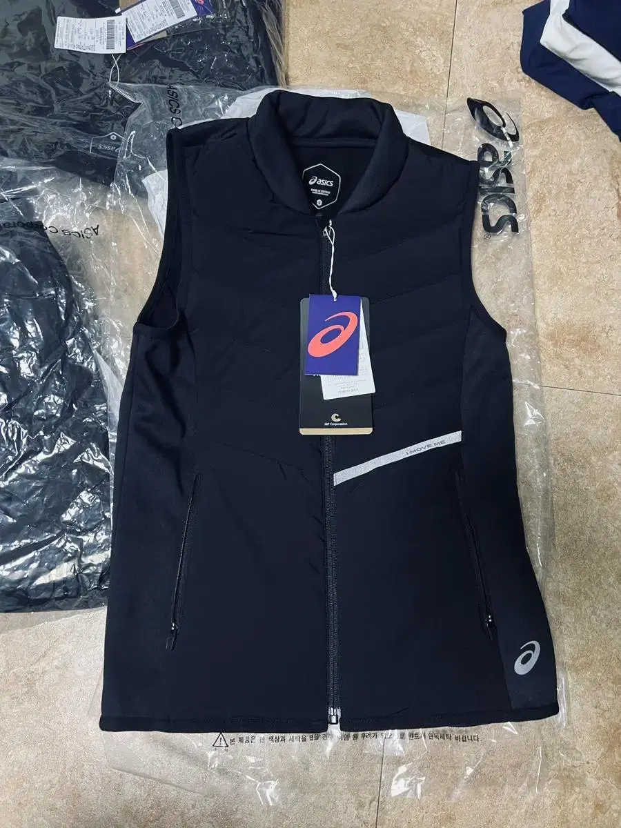 90(S) Women's Asics MoveFit Down Vest