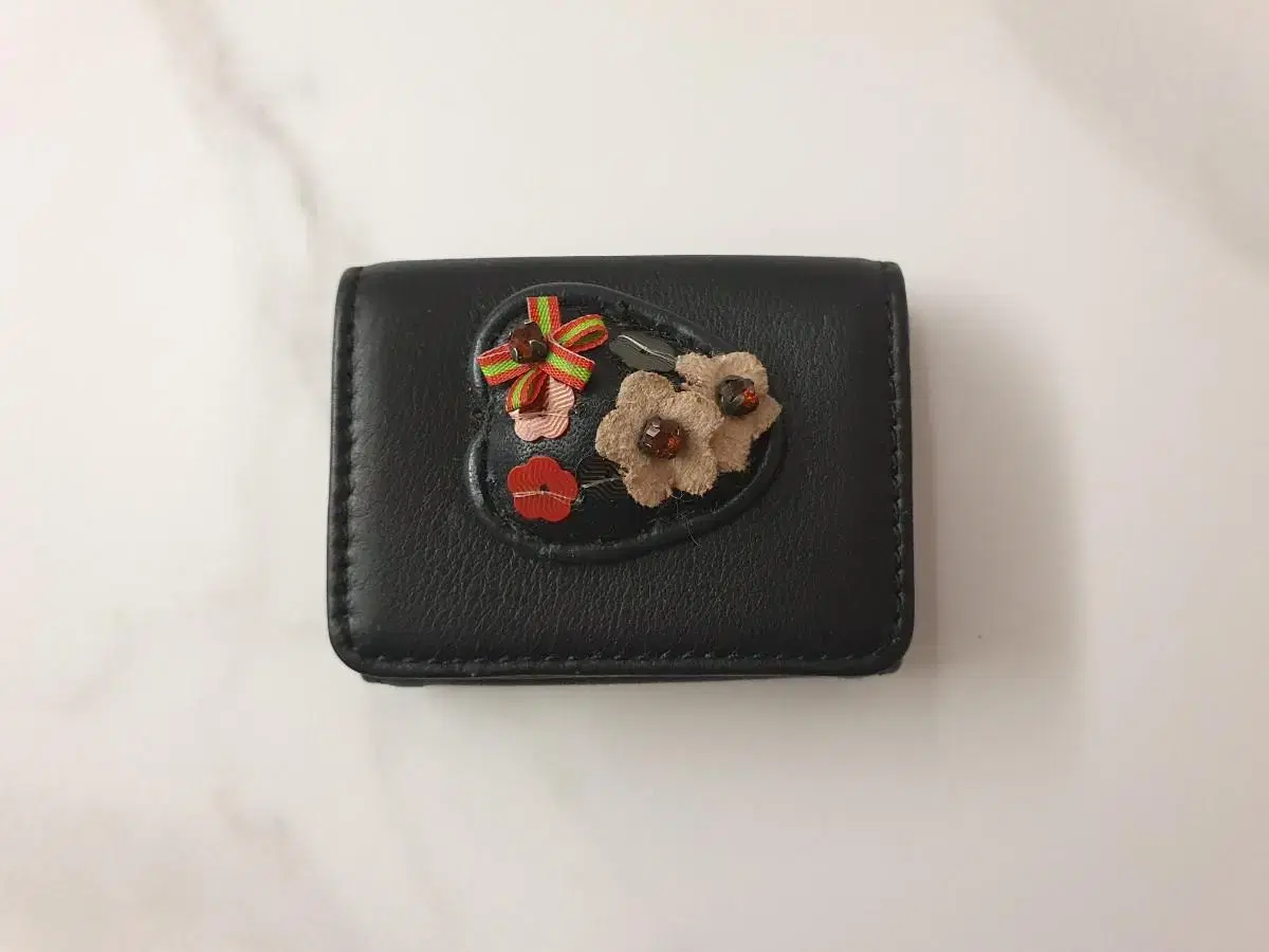 Christian Lacroix and vintage leather mini photo holder