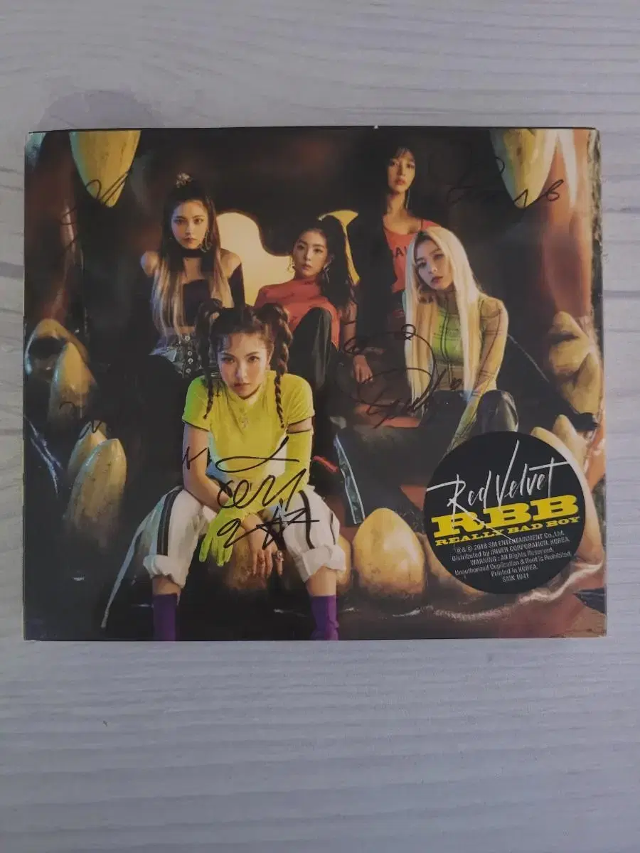 Red velvet autographed album.