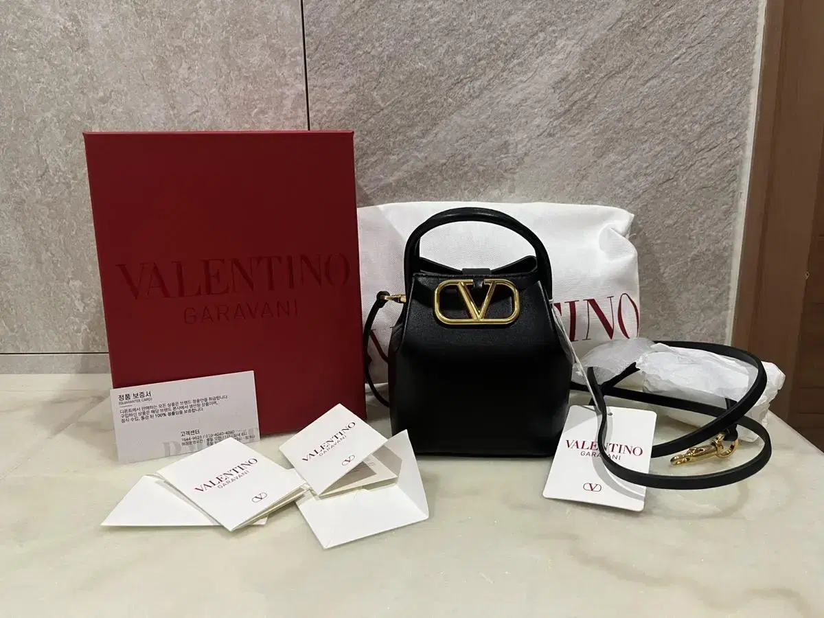 Valentino V Logo Mini Crossbody Bucket Bag