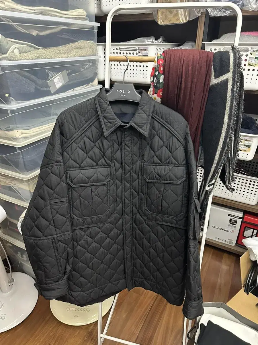 [46] Quilted zip-up shirt from Junji's FW22 collection.