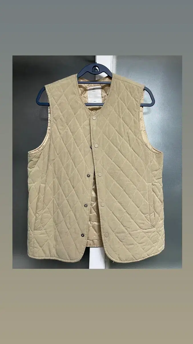 Beige padded vest