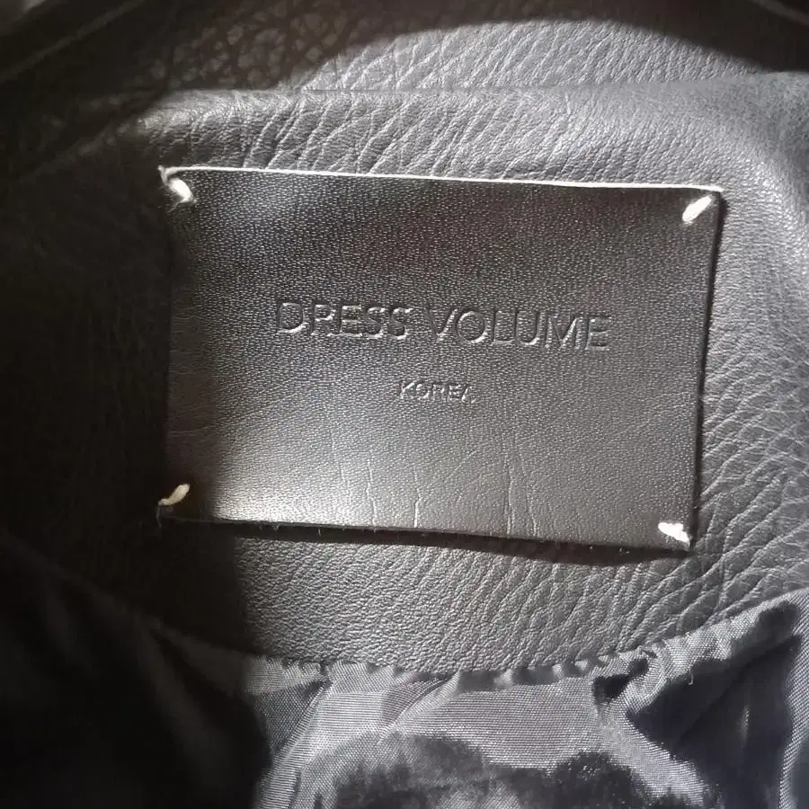 DRESS VOLUME   라이더 자켓