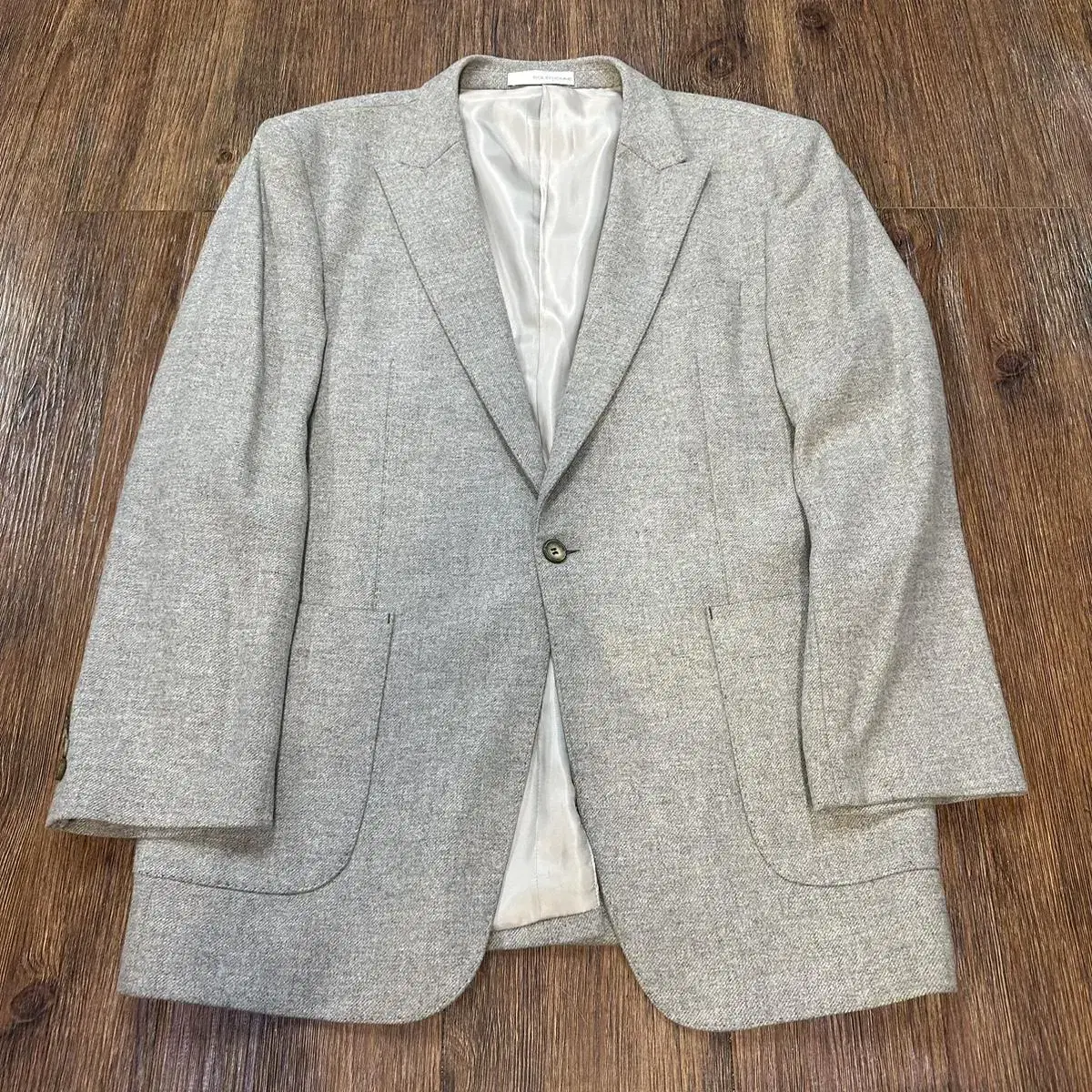 This is a solid Homme jacket in size 52.