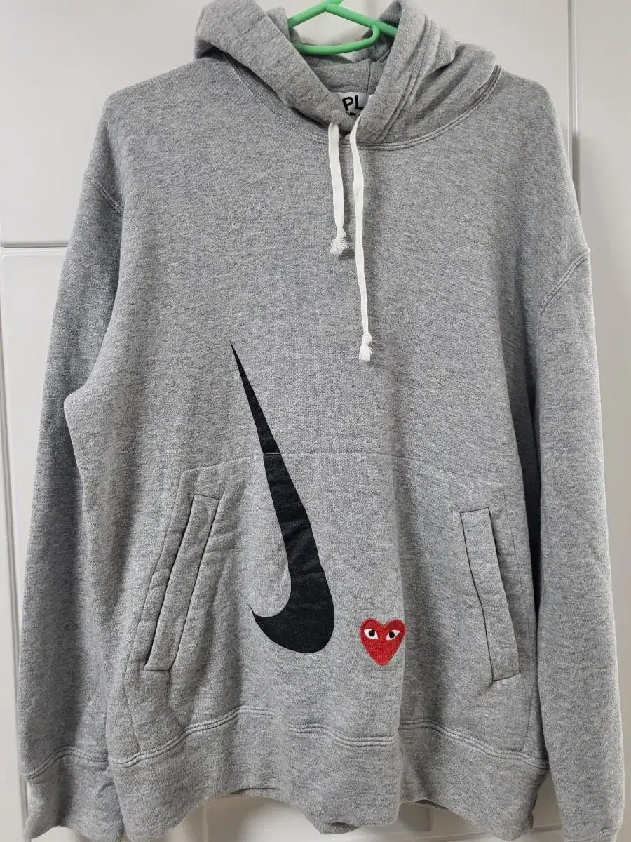 Comme des Garçons Song Nike Hoodie