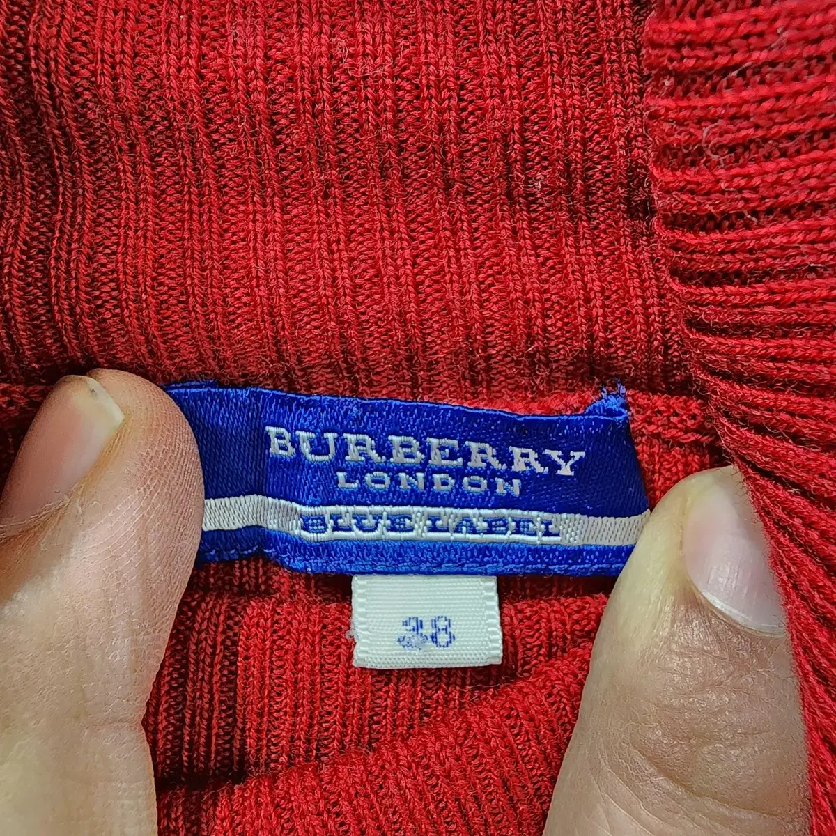 버버리(Burberry) 목폴라 니트